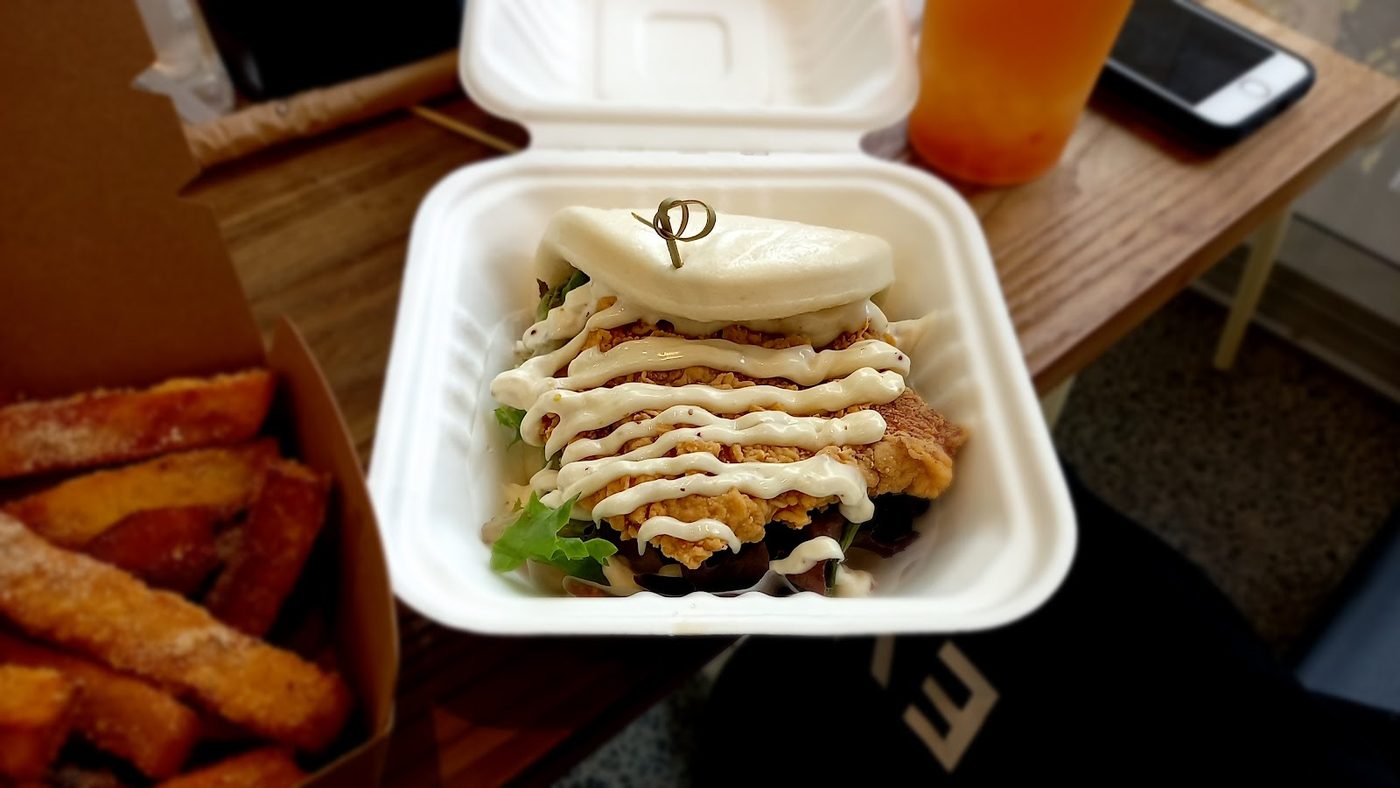 Filled bun with crispy snacks